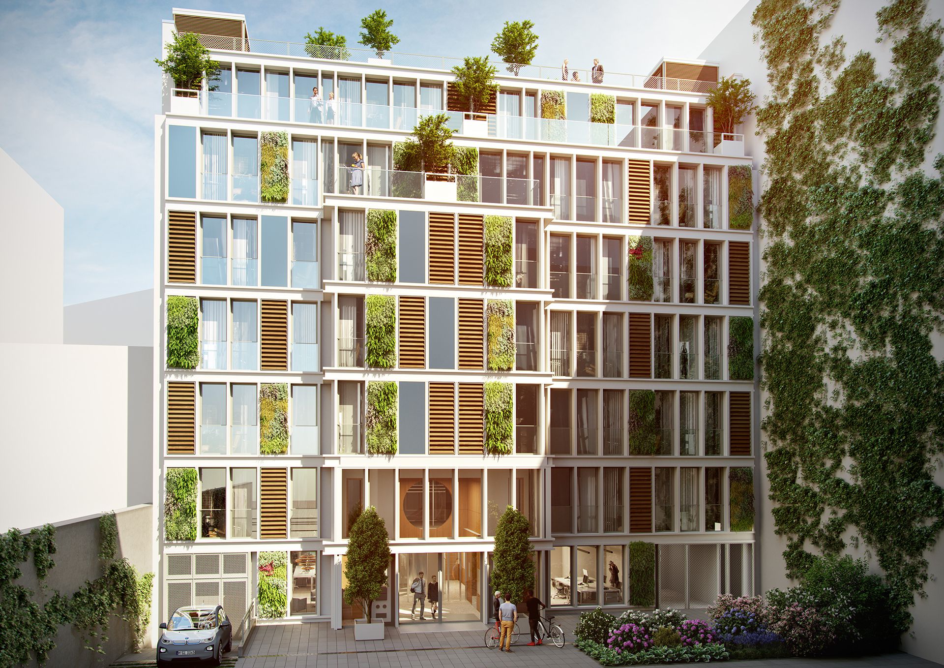 Fassade des Wohn- und Geschäftshauses in der Bundesallee 215 mit Fensterfronten und Bepflanzung